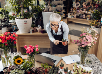 Side Hustles and The Power of Diversified Income Elderly woman working as a florist during her retirement as a side hustle